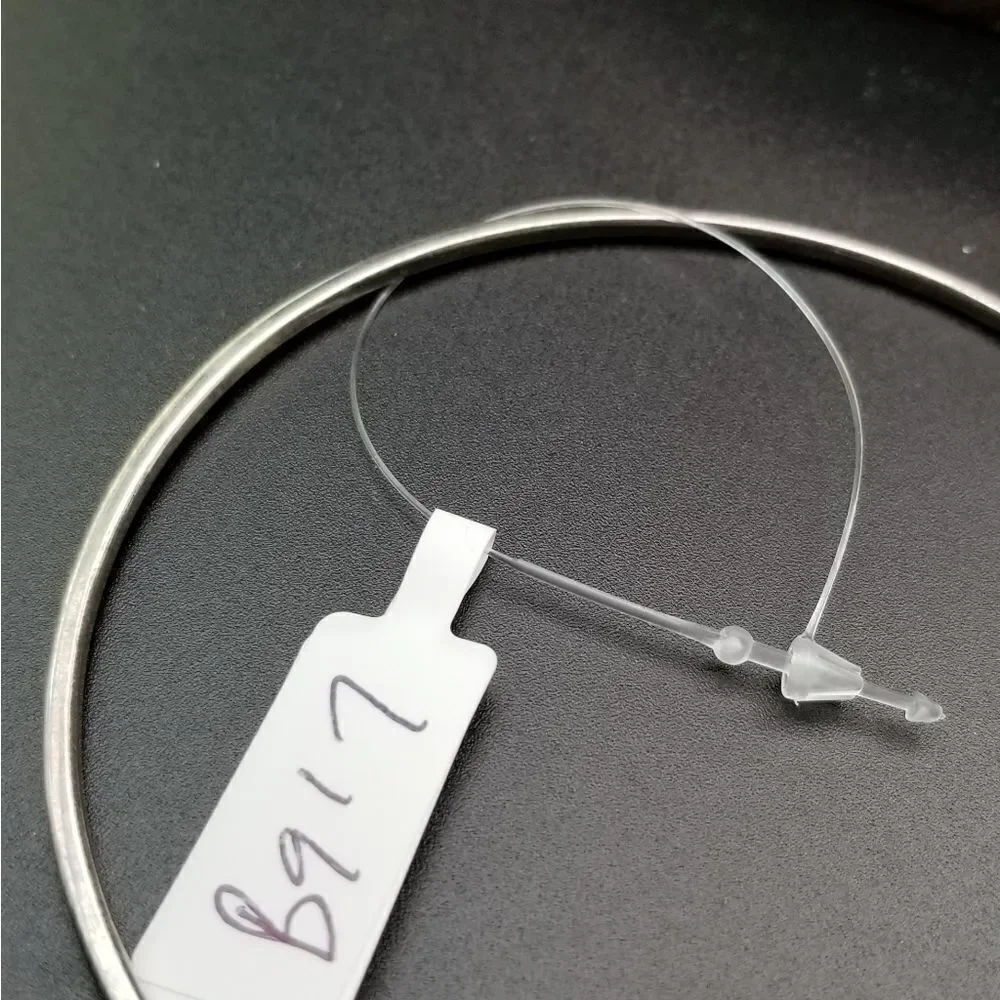 Silver tone rounded bangle bracelet  B917